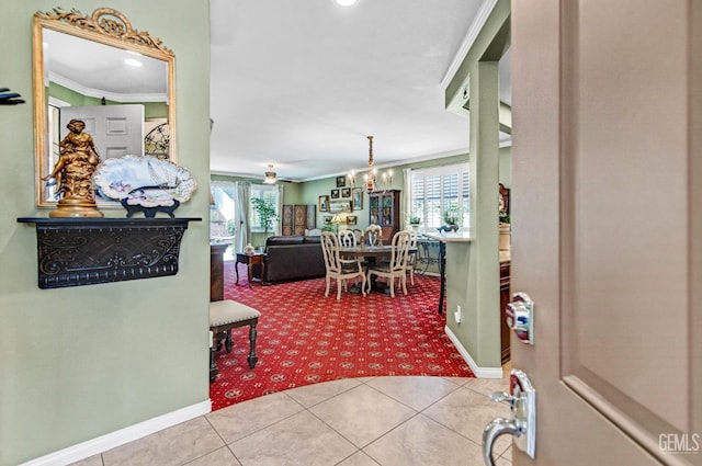 14030 Sandstone Peak Dr, Bakersfield, CA 93306 - carpeted foyer with healthy amount of natural light, crown molding, a chandelier, and tile patterned flooring