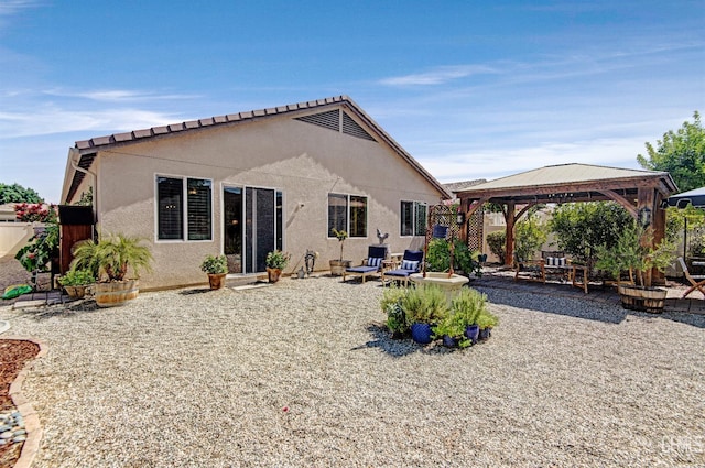 14030 Sandstone Peak Dr, Bakersfield, CA 93306 - rear view of house featuring a gazebo, a patio, and stucco siding