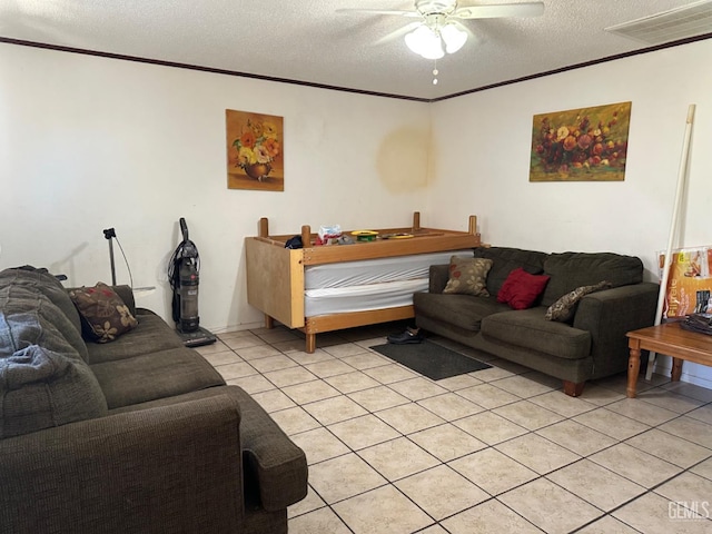 819 Stephen Ct, Wasco, CA 93280 - living room with a textured ceiling, a ceiling fan, light tile patterned floors, and crown molding