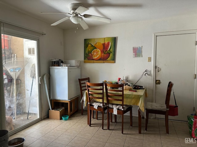 819 Stephen Ct, Wasco, CA 93280 - dining space with washer / clothes dryer, ceiling fan, and light tile patterned flooring