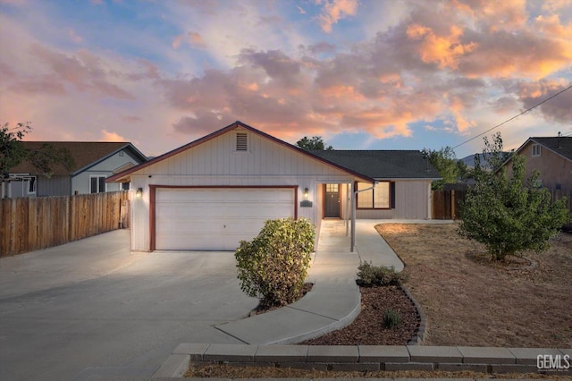 ranch-style home with a garage