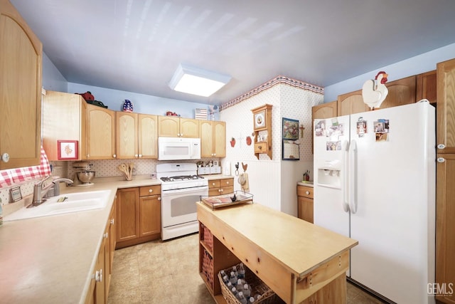 kitchen featuring decorative backsplash, sink, white appliances, and light brown cabinets