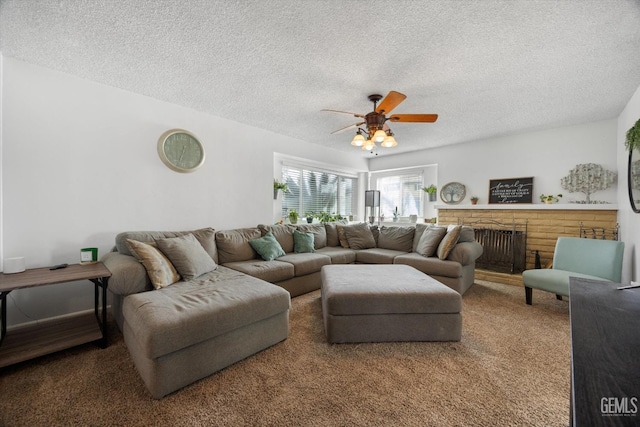 living room with carpet floors, radiator, a brick fireplace, and a textured ceiling