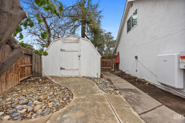 view of shed featuring a fenced backyard