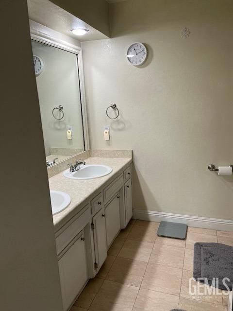 2626 E Cleo Ct Unit 29, Bakersfield, CA 93306 - bathroom featuring double vanity and tile patterned flooring