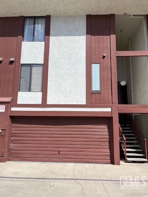 2626 E Cleo Ct Unit 29, Bakersfield, CA 93306 - interior space featuring stairs and a garage
