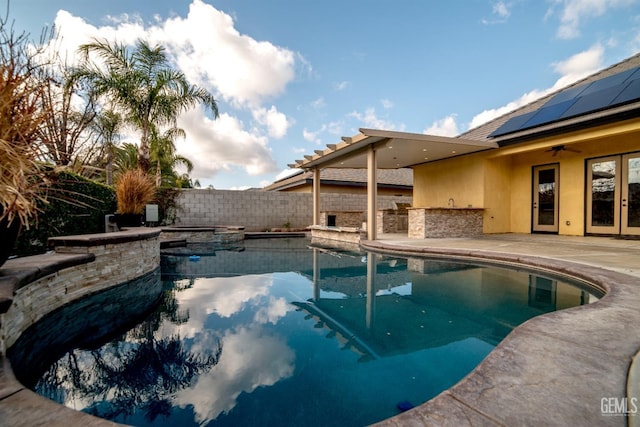 view of swimming pool with area for grilling and a patio