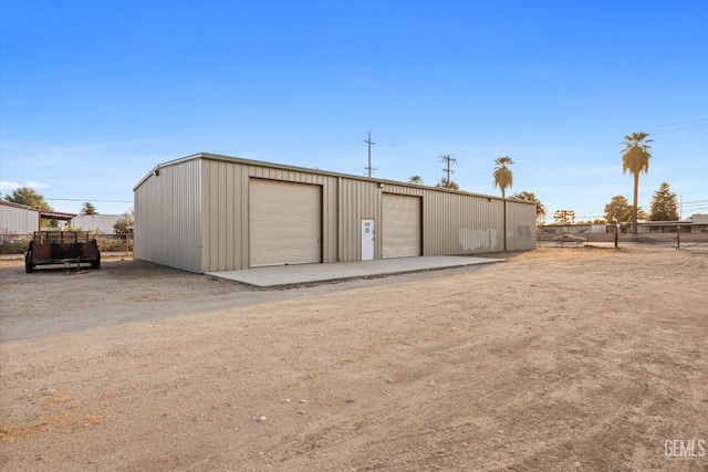 view of outdoor structure featuring a garage