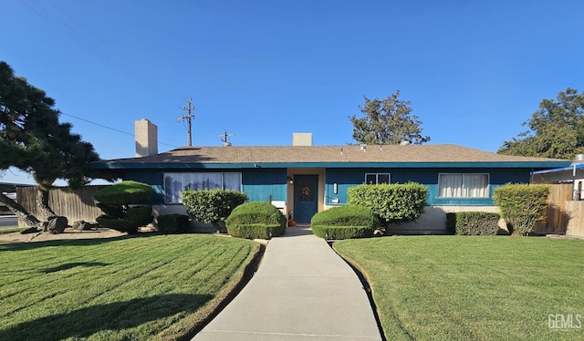 ranch-style house featuring a front lawn