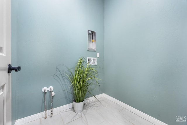 bathroom with baseboards