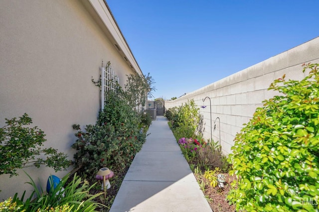 view of home's community with fence