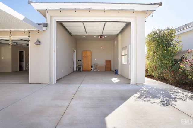 garage featuring driveway