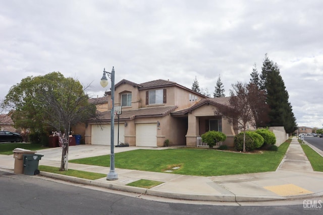 traditional home featuring stucco siding, a tile roof, concrete driveway, a front yard, and a garage