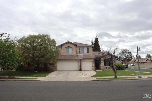 traditional-style home featuring a front lawn, a tile roof, stucco siding, a garage, and driveway