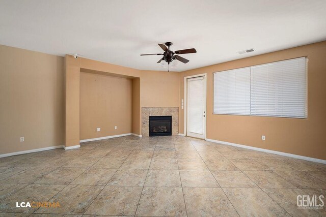 empty room featuring visible vents, baseboards, stairway, arched walkways, and a sink