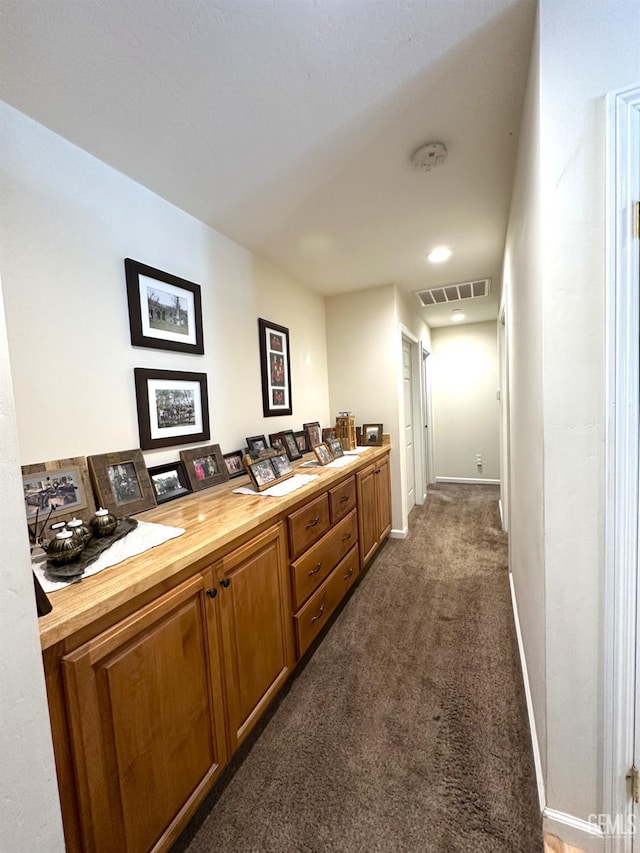 45796 Rocking K Dr, Cal Hot Springs, CA 93207 - hall with dark colored carpet and baseboards