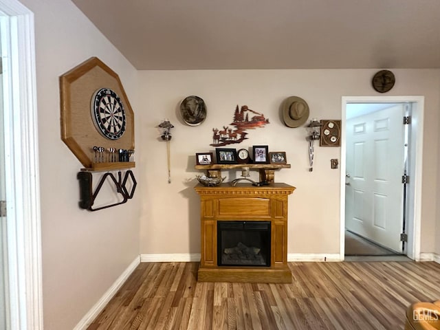 45796 Rocking K Dr, Cal Hot Springs, CA 93207 - living room featuring wood finished floors, baseboards, and a glass covered fireplace
