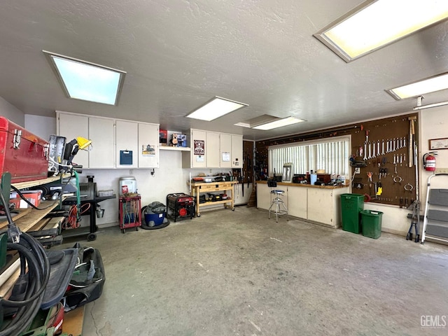 45796 Rocking K Dr, Cal Hot Springs, CA 93207 - garage featuring a workshop area