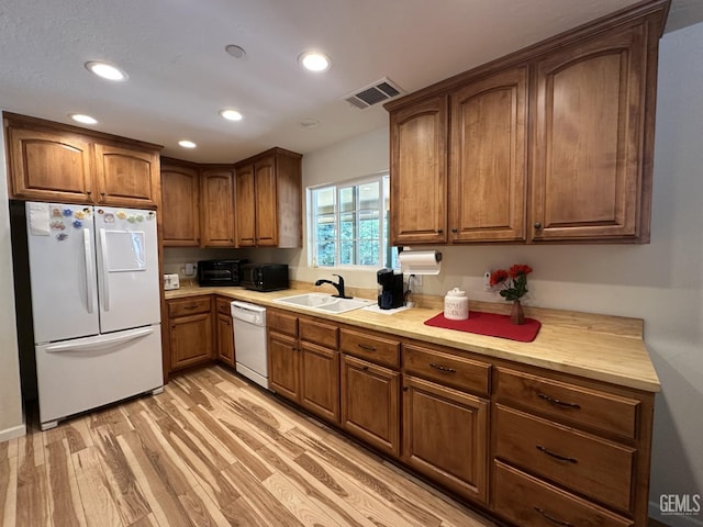 45796 Rocking K Dr, Cal Hot Springs, CA 93207 - kitchen with white appliances, a sink, light wood finished floors, light countertops, and recessed lighting