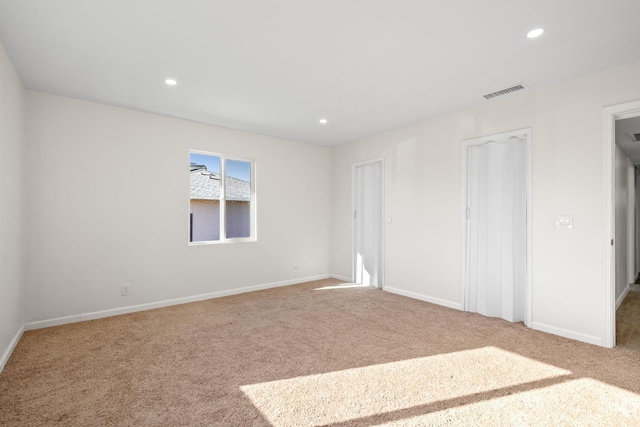 409 Jane St, Bakersfield, CA 93306 - unfurnished bedroom with baseboards, recessed lighting, and carpet