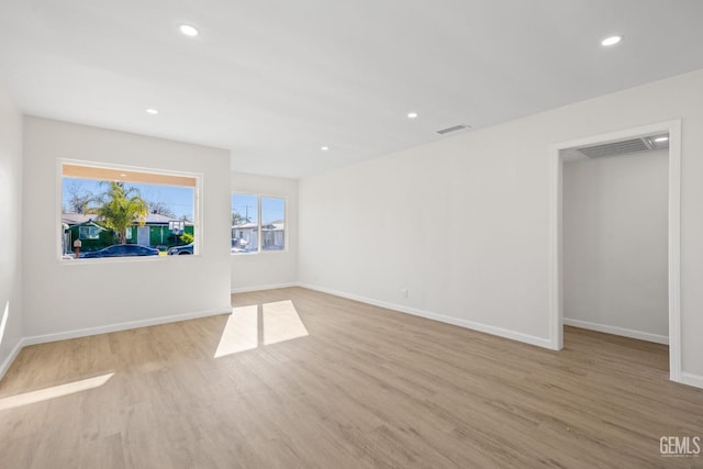 409 Jane St, Bakersfield, CA 93306 - unfurnished room featuring wood finished floors, recessed lighting, baseboards, and visible vents