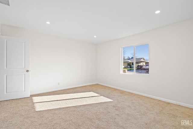 409 Jane St, Bakersfield, CA 93306 - carpeted spare room with baseboards, visible vents, and recessed lighting