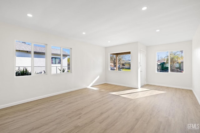 409 Jane St, Bakersfield, CA 93306 - empty room featuring plenty of natural light, light wood-style flooring, and recessed lighting