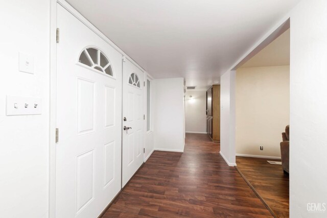 hall featuring dark hardwood / wood-style floors