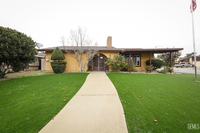 view of front of home with a front yard