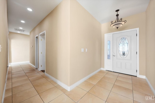 entryway featuring light tile patterned floors