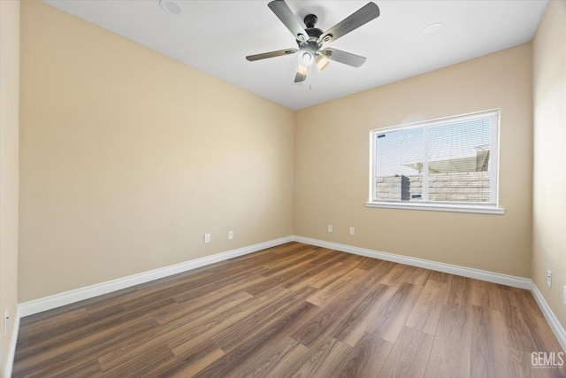 unfurnished room featuring hardwood / wood-style flooring