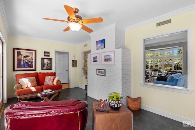 2615 22nd St, Bakersfield, CA 93301 - living room featuring a ceiling fan, visible vents, dark tile patterned floors, and ornamental molding