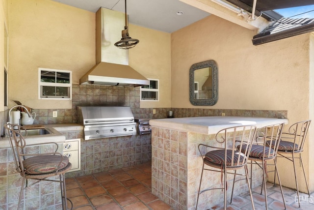2615 22nd St, Bakersfield, CA 93301 - view of patio featuring exterior kitchen, grilling area, outdoor wet bar, and a sink