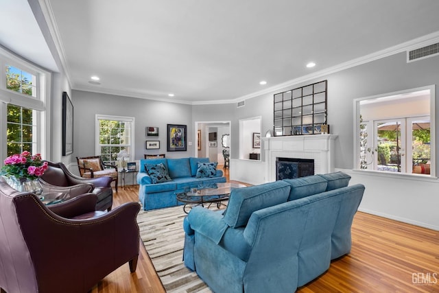 2615 22nd St, Bakersfield, CA 93301 - living room with a fireplace, visible vents, ornamental molding, and recessed lighting