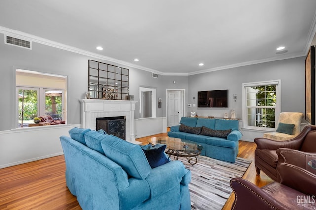 2615 22nd St, Bakersfield, CA 93301 - living area with recessed lighting, wood finished floors, visible vents, and a fireplace