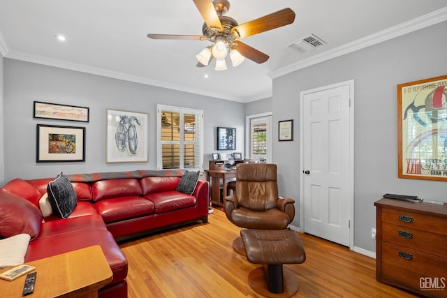 2615 22nd St, Bakersfield, CA 93301 - living room featuring wood finished floors, visible vents, crown molding, baseboards, and ceiling fan