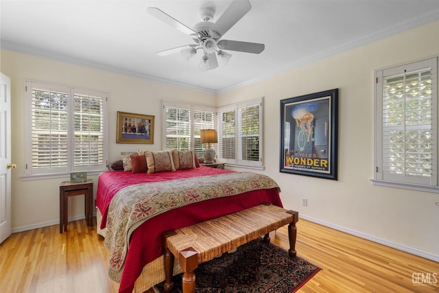 2615 22nd St, Bakersfield, CA 93301 - bedroom with baseboards, wood finished floors, ornamental molding, and ceiling fan