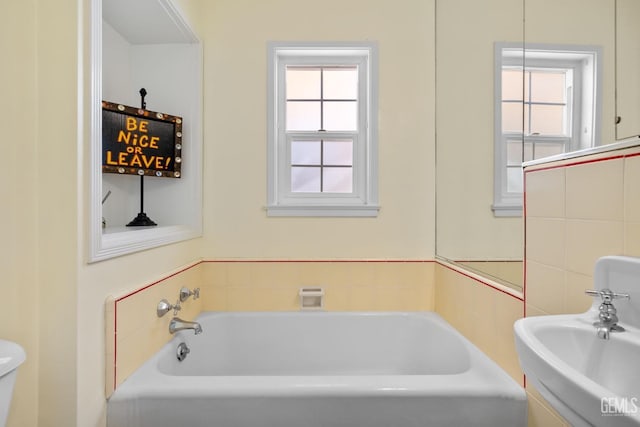 2615 22nd St, Bakersfield, CA 93301 - full bathroom with toilet, a sink, and a bathing tub