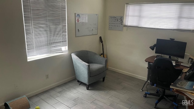 office area featuring wood finished floors and baseboards