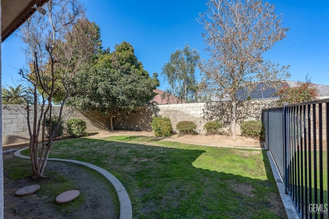 view of yard featuring a fenced backyard