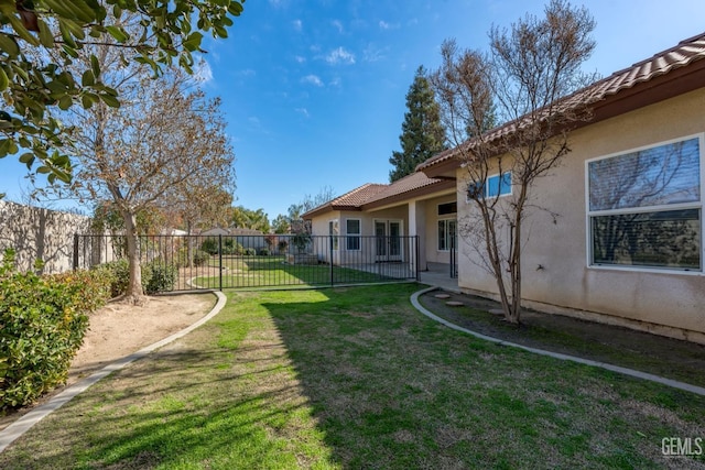 view of yard featuring fence