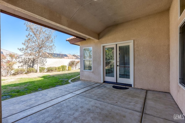 view of patio with a fenced backyard and french doors