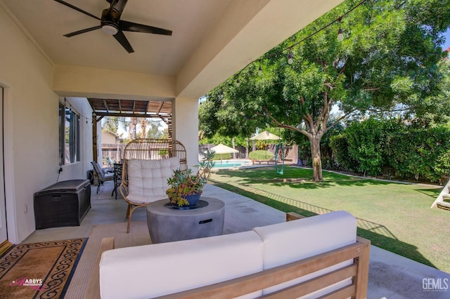 11820 Crescent Creek Ct, Bakersfield, CA 93311 - fenced backyard featuring outdoor lounge area, a patio, and a ceiling fan