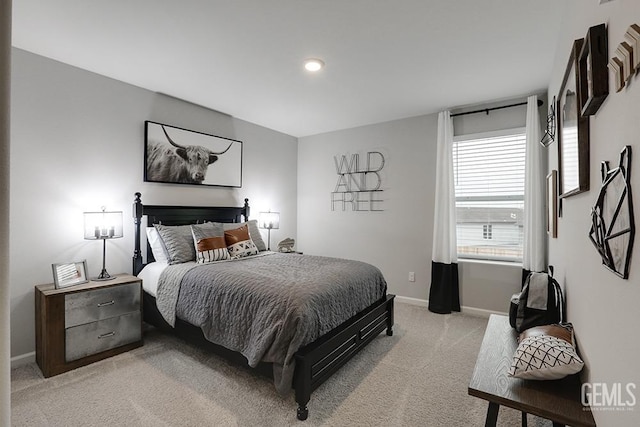 bedroom with light colored carpet