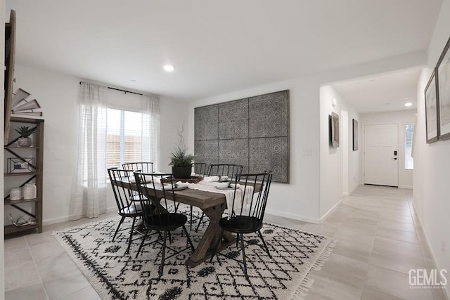 dining room featuring light tile patterned flooring