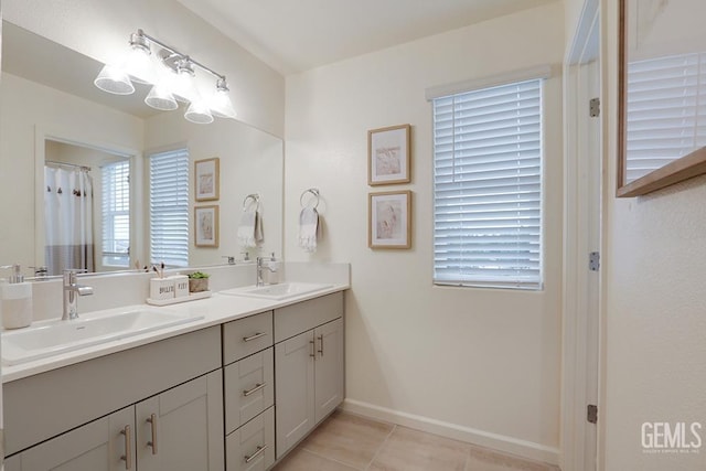 bathroom with vanity and tile patterned floors