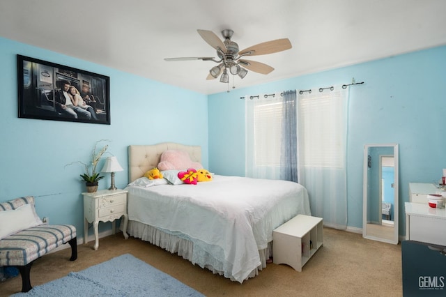 carpeted bedroom with ceiling fan