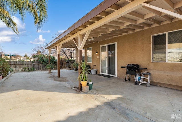 view of patio with a grill