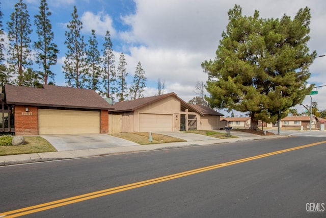 ranch-style house featuring a garage