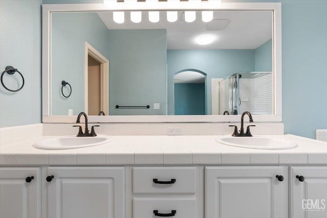 11311 Mezzadro Ave, Bakersfield, CA 93312 - bathroom with double vanity and a stall shower